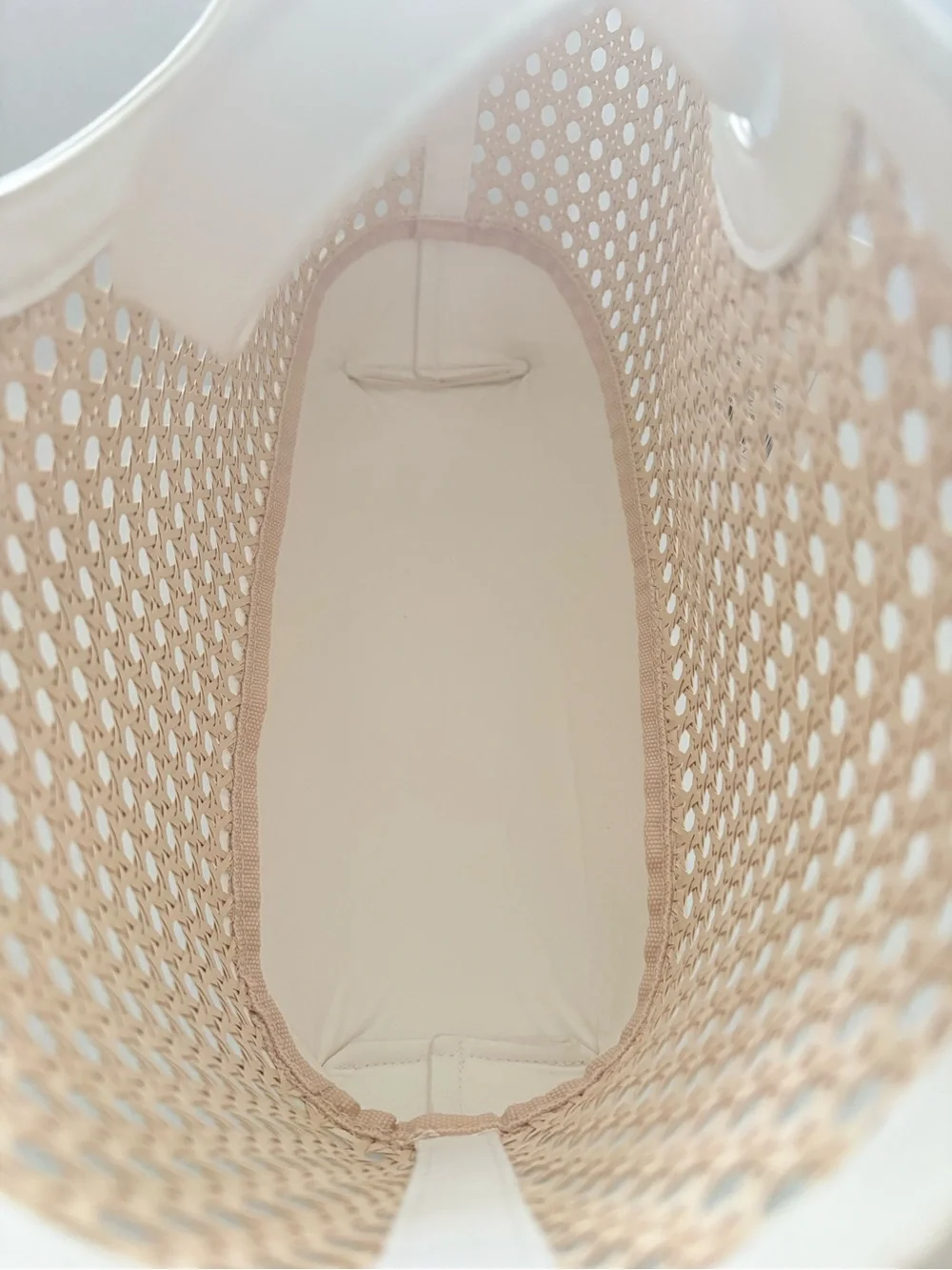 A New Day Straw Caning Tote Bag natural woven cane design white trim detailing.